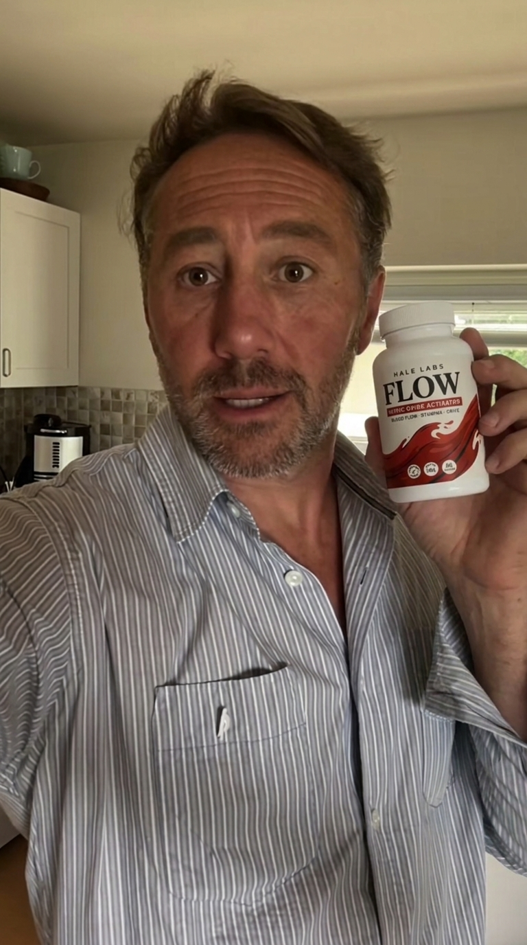 Man holding Flow bottle